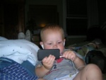Kids just seem to start using electronics at younger and younger ages these days.  (I never had an Ipod when I was 1 year old!)