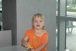 Molly plays with toy plane.