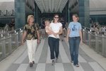 Nancy, Jamie and Katie walk out of the Air and Space Museum with Jill