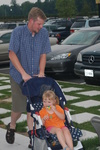 Dave pushes stroller with Jill